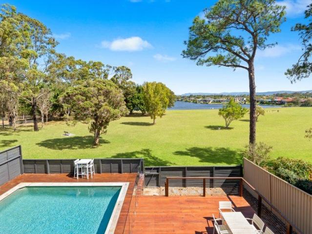 PARK, LAKE & HINTERLAND VIEWS A RARE GOLD COAST LIFESTYLE