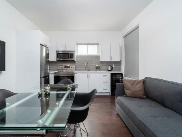 Parkdale Toronto Furnished House Entire Floor Rental on King Street Unique 2 Bedroom, 2 Bath with Exposed Brick and Private Yard