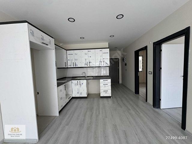 Pascha Emlak'tan Satılık Güzelçamlı Merkezde Sıfır 2+1 Daire
