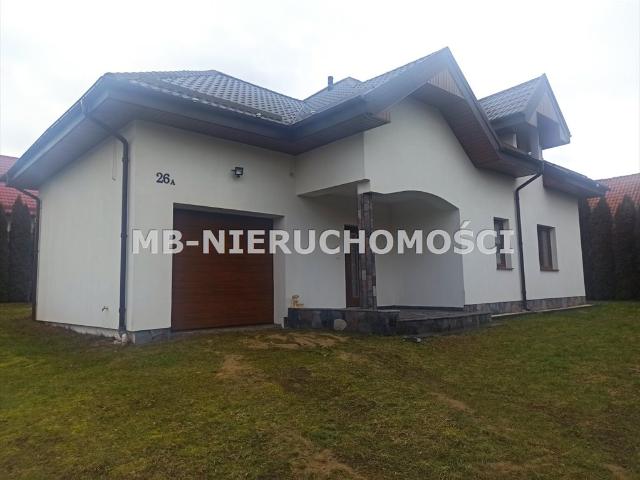 Funkcjonalny dom 250 m2 z garażem i ogrodem w Patrykach