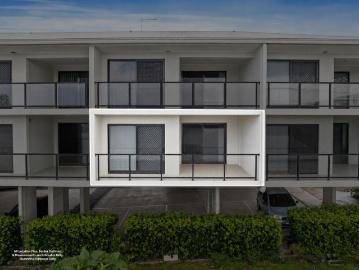 Paul Penklis Presents: A Stylish Low Maintenance Unit in A Quiet, Elevated Position