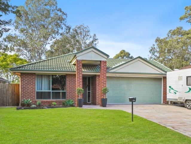Paul Penklis Presents: Spacious Low Set Living in a Prime Meadowbrook Location!