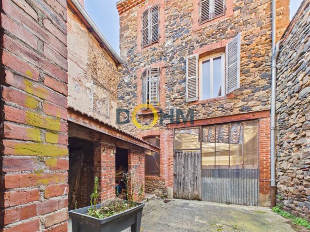 Paulhaguet Maison de bourg avec garage, grange et cour de