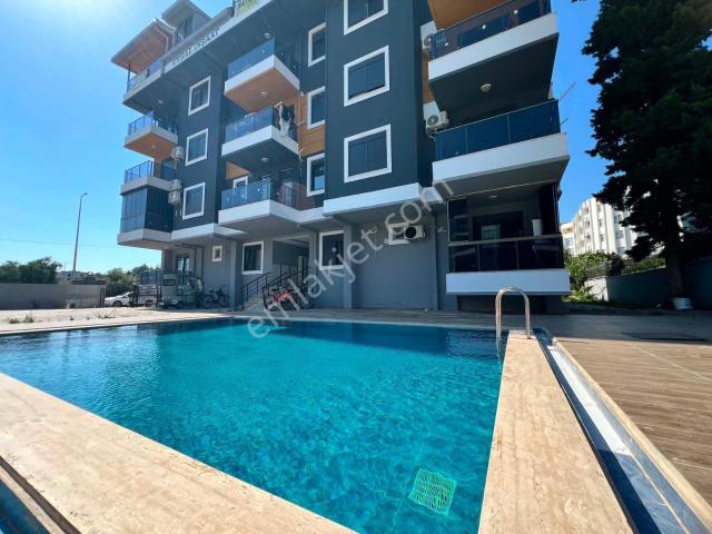 Pazarcı Mahallesi Cam Balkonlu Satılık 1+1 Yüksek Giriş