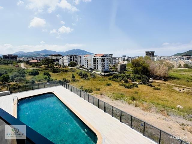 Pazarcı mahallesinde önü kapanmaz manzaralı 1+1 kiralık daire