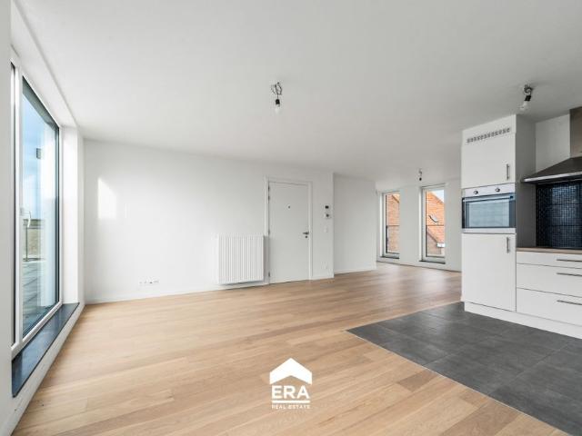Penthouse 2 slaapkamers + terras en garage en staanplaats
