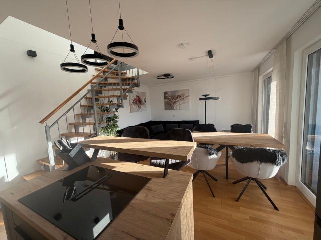 Penthouse apartment with balcony and terrace, underground parking space in Munich