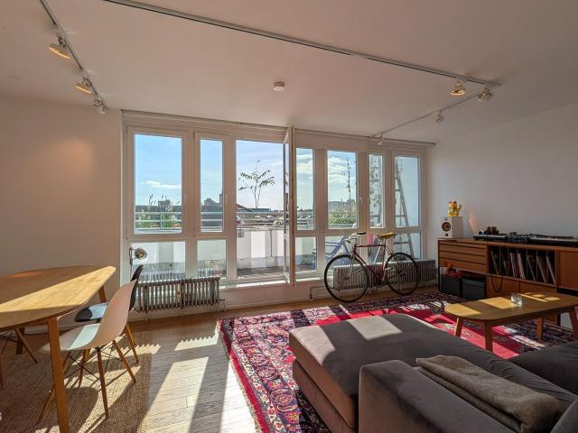 Penthouse apartment with huge sunny balcony and view over the roofs of Kreuzberg, Berlin Amsterdam Apartments for Rent