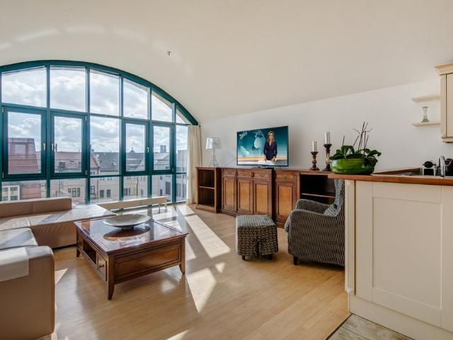 Penthouse apartment with terrace and view over the roofs