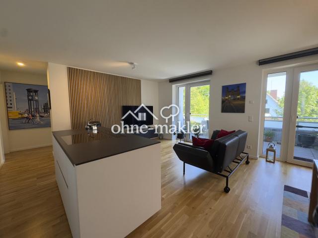 Penthouse im Staffelgeschoss mit großzügigem Wohnbereich, Balkon und hochwertiger Ausstattung