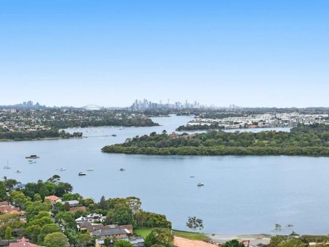 Penthouse one bedroom plus study with iconic water and skyline views