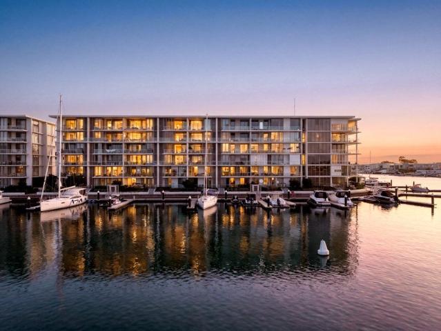 PENTHOUSE LEVEL WATERFRONT LIVING WITH PANORAMIC VIEWS