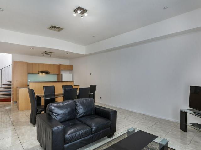 Penthouse Living in the Heart of Glenelg with Private Rooftop Terrace
