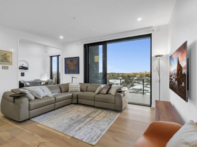 Penthouse Living with River & City Views