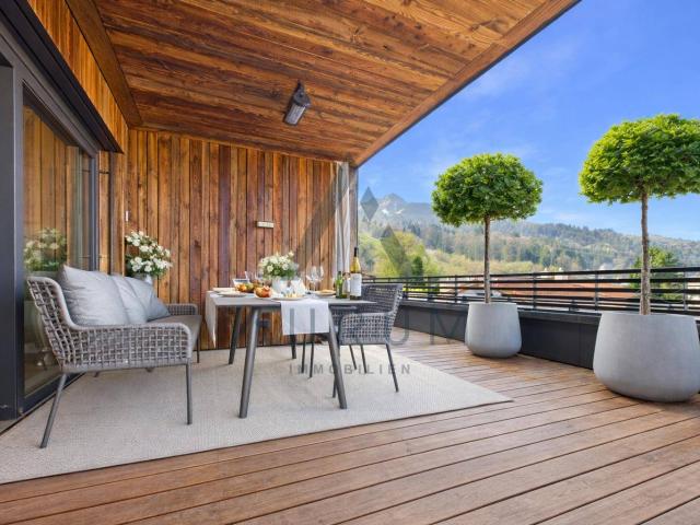 Penthouse mit Dachterrasse & Whirlpool in zentraler und pistennaher Lage mit Kaiser & Hornblick