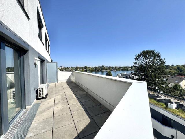 Penthouse mit Donaublick und 360 Grad Dachterrasse direkt an der Alten Dona