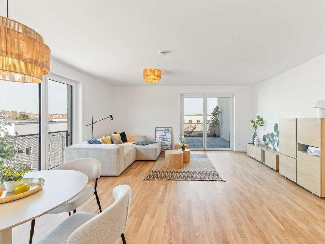 Penthouse mit großer Dachterrasse in modernem Wohnviertel
