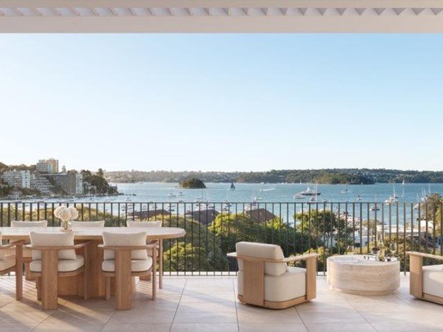 Penthouse residence with sweeping water views and expansive north facing living