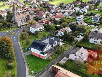 Dachgeschosswohnung in Poliez Pittet
