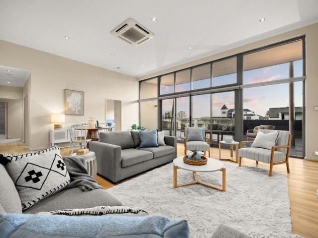 Penthouse Waterfront Living with Private Boat Mooring