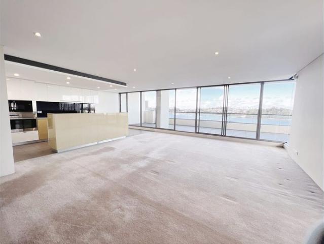 Penthouse with spectacular water views, freshly painted with near new carpet.