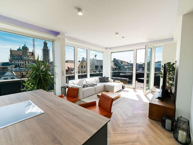 Penthouse Traum: 2 Zimmer mit Dachterrasse & atemberaubendem Blick