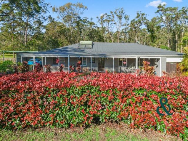 Peace, privacy & plenty of space for family & vehicles on 1.2 Acres