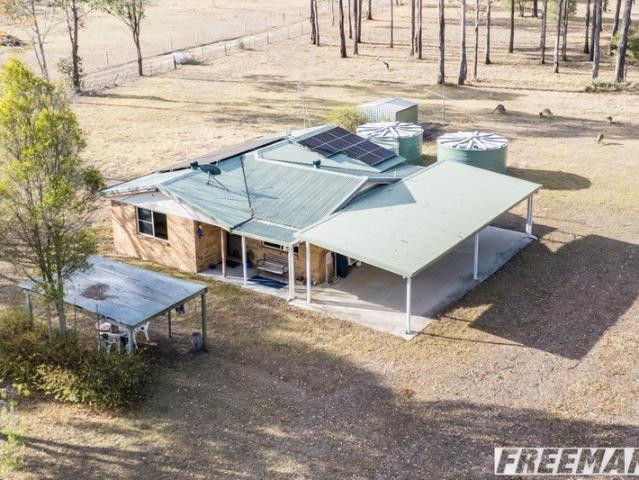 PEACE & QUIET ON 6.3 ACRES