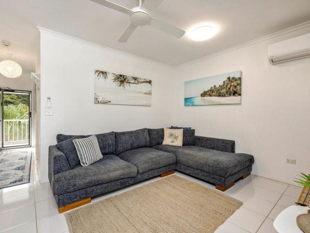 Peaceful top floor living moments from Palm Cove esplanade