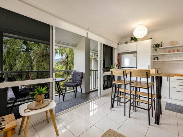 Peaceful top floor living moments from Palm Cove esplanade