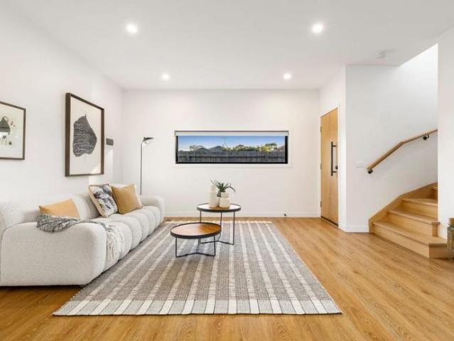 Peaceful Two Level Home with Sunlit Alfresco Living