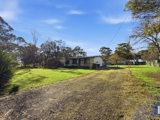 Peaceful Village Living on a Generous Half Acre