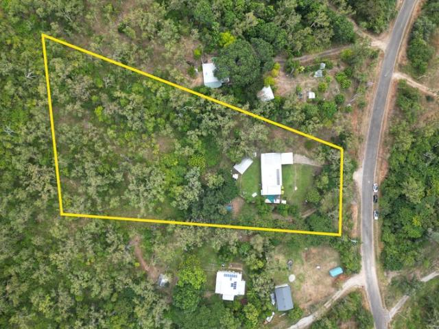 Peaceful Acreage Oasis with Powered Shed & Outdoor Living!