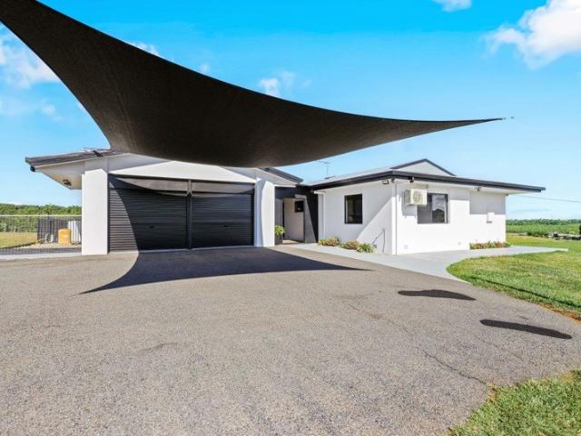 Peaceful Acreage Haven with Panoramic Views