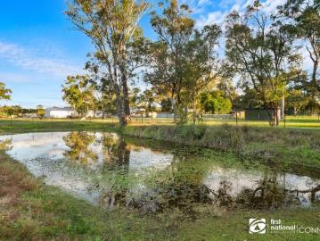 Acreage Living at Its Finest 4 Acres of Space, Serenity & Style