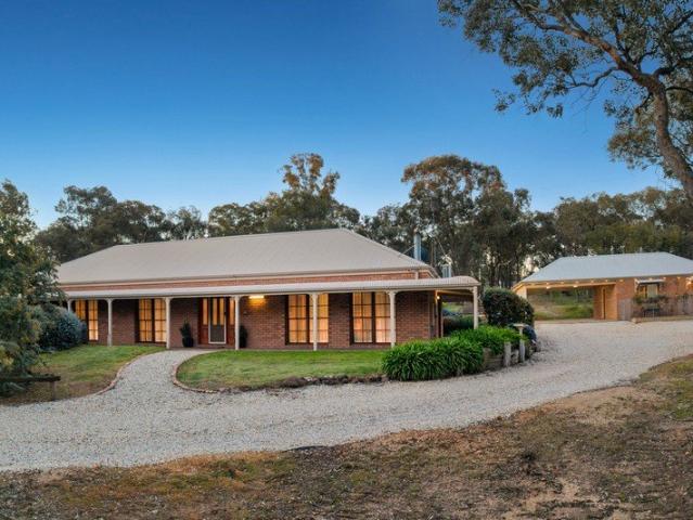 Peaceful Acreage Living with a Man Cave Like No Other