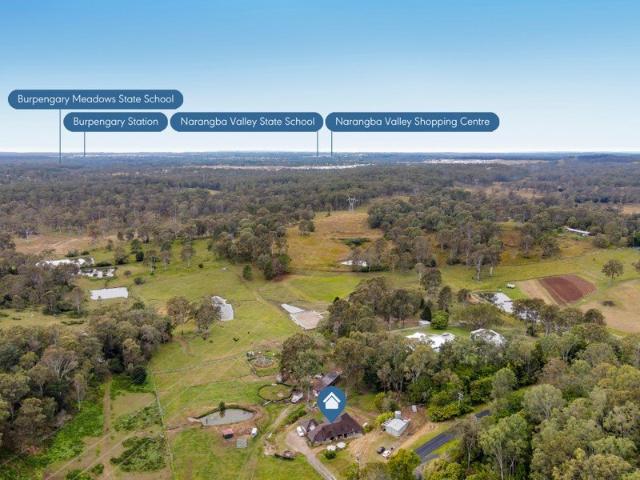 Peaceful Acreage Living with Exceptional Horse Facilities & Endless Lifestyle Appeal!