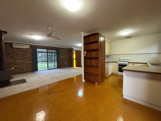 Peaceful Acreage Living with Huge Shed & Expansive Grounds