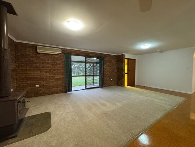 Peaceful Acreage Living with Huge Shed & Expansive Grounds