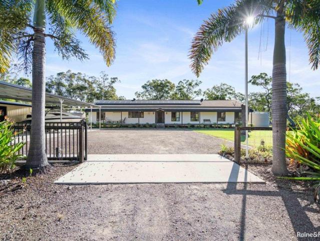 Peaceful Acreage Living with Lifestyle Appeal