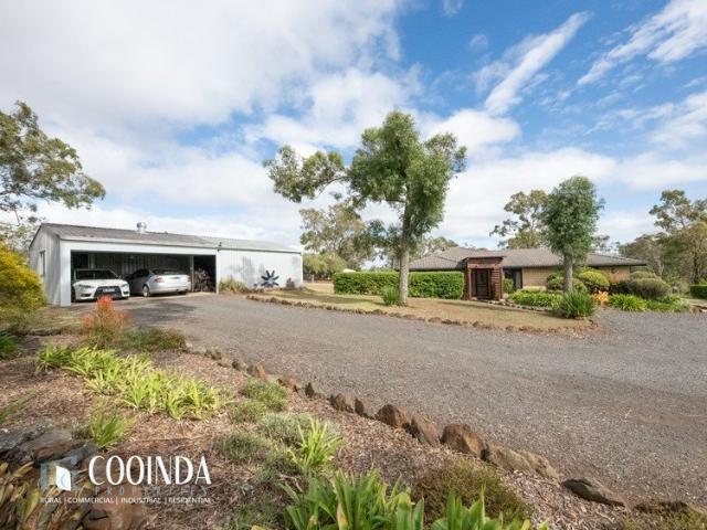 Peaceful Acreage Living with Solar & Massive Sheds