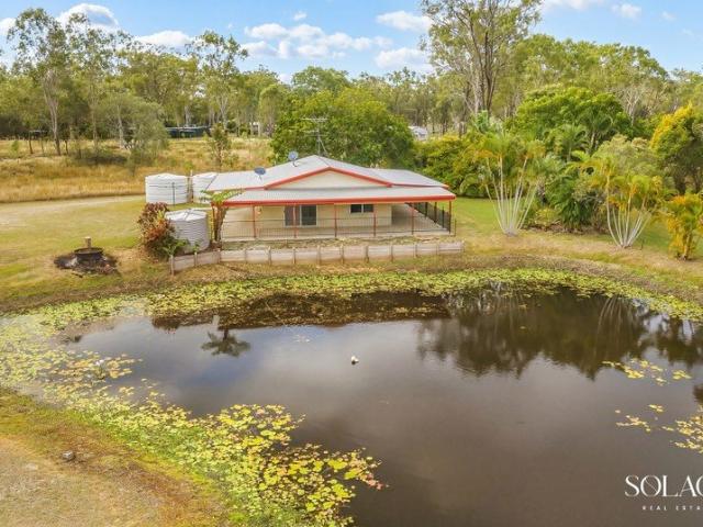 Peaceful Acreage Living with Water, Space & Rural Charm!