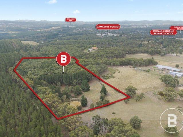 PEACEFUL ACREAGE LIVING WITHIN CITY LIMITS