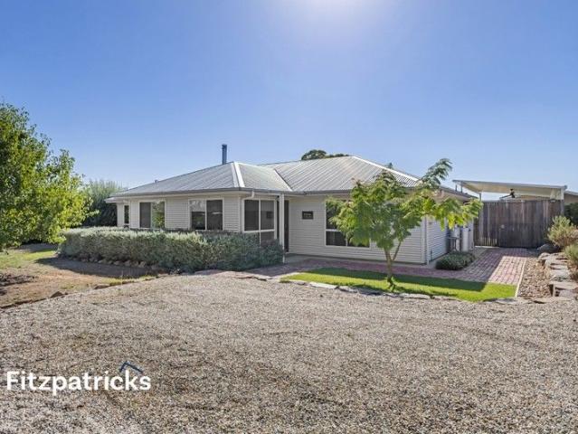 Peaceful Acreage Living Awaits