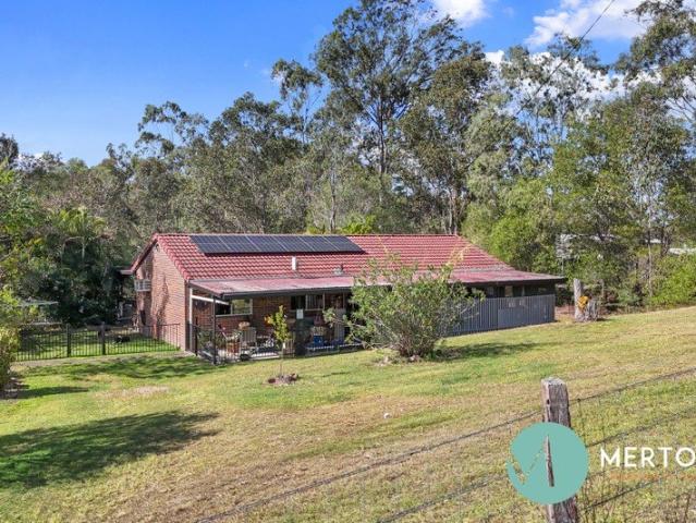 Peaceful Acreage Living at The Palms