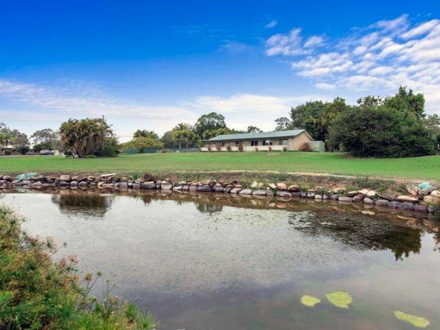 Peaceful Acreage Living, Immaculate Presentation & Timeless Appeal