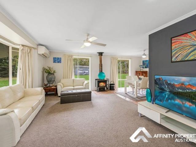 PEACEFUL ACREAGE LIVING ON 8,000m² – Your Private Family Retreat!