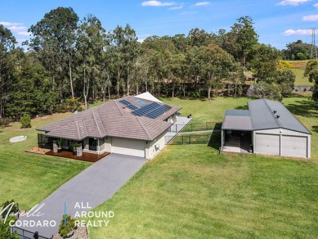 OVER AN ACRE + 11 CAR ACCOMMODATION + EXECUTIVE FAMILY HOME