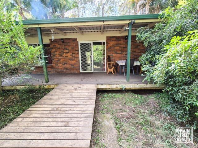 Peaceful Brick Home on 5.12 Acres with Two Dams