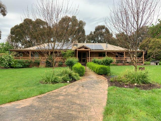 Peaceful Country Living in a Beautiful Garden Setting